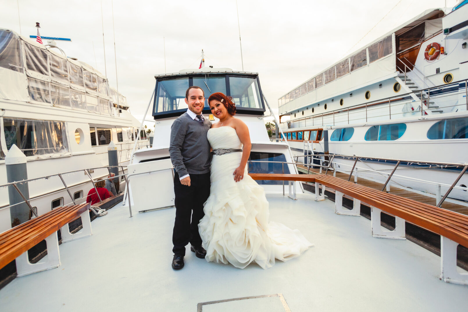 Bride & groom posing for a photo on the Hornblower Cruises