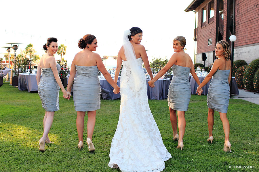 Bridesmaids holding hands