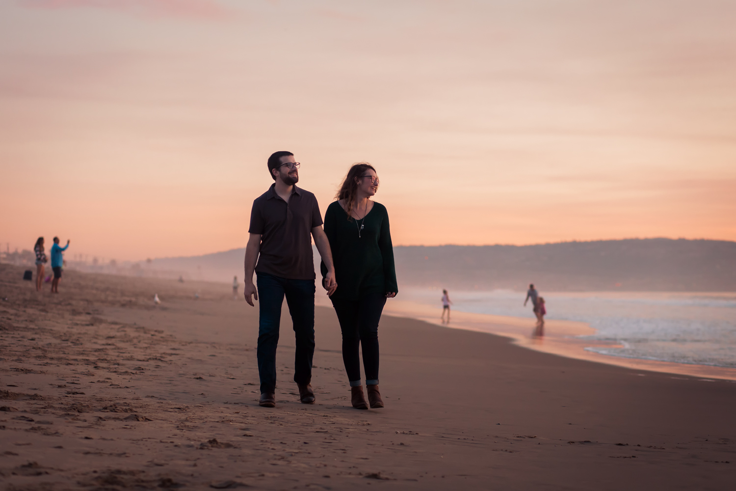 Sunset on the beach for engaged couple