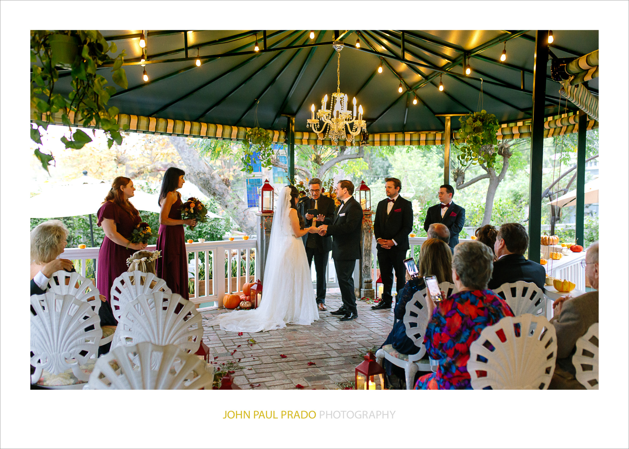 Wedding ceremony at the back brick patio at the Tea House Los Rios